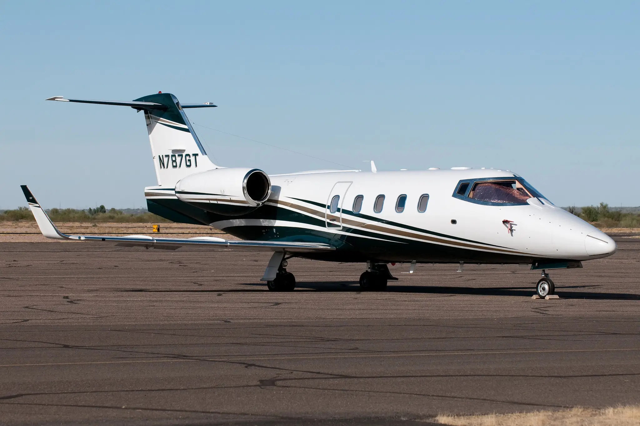 Learjet 55 photo showing a private jet on the runway ready for takeoff